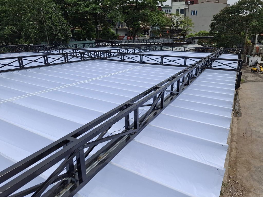 Bạt mái xếp lượn sóng sân thượng Bạt mái xếp lượn sóng sân thượng