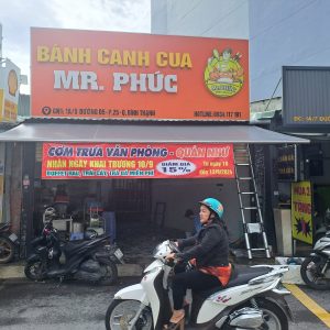 Bạt che nắng mưa quay tay che nắng mưa hiên cửa hàng