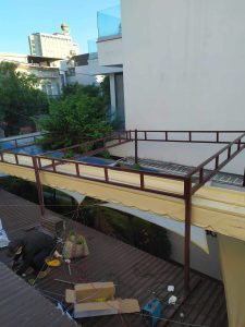 Bạt mái xếp lượn sóng che nắng sân thượng Bạt mái xếp lượn sóng che nắng sân thượng