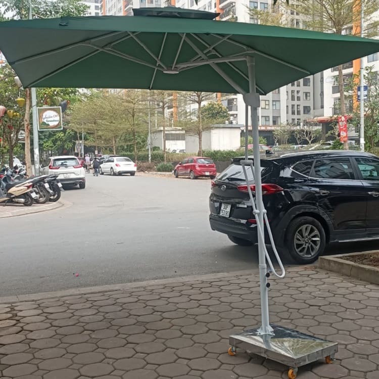 Dù lệch tâm vuông 3m đòn trợ lực màu xanh che nắng quán cafe Dù lệch tâm vuông 3m đòn trợ lực màu xanh che nắng quán cafe